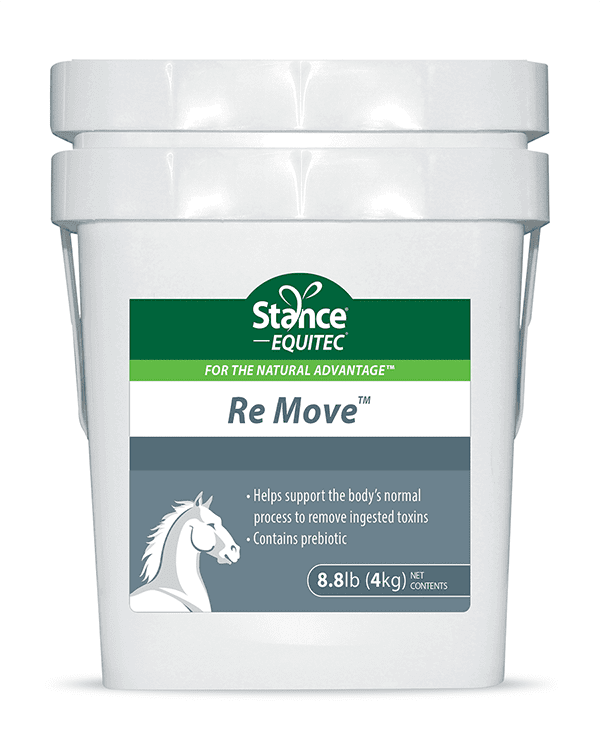 A bucket of horse feed with the words " re move ".